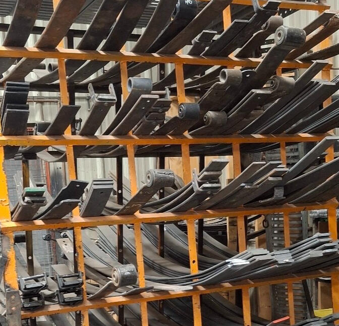 Inventory of replacement leaf spring packs for trucks, trailers, commercial vehicles, and fleet applications at Standard Auto Spring Works.