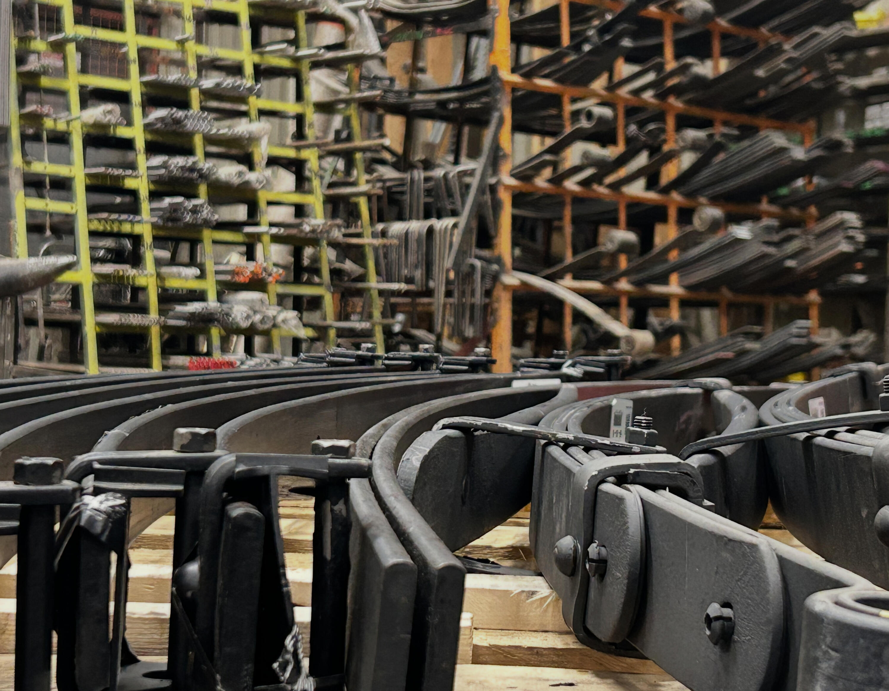 Heavy-duty leaf spring packs, repair kits, U-bolts, shackles, bushings, centre bolts, and suspension hardware stocked by Standard Auto Spring Works in Winnipeg, Manitoba.