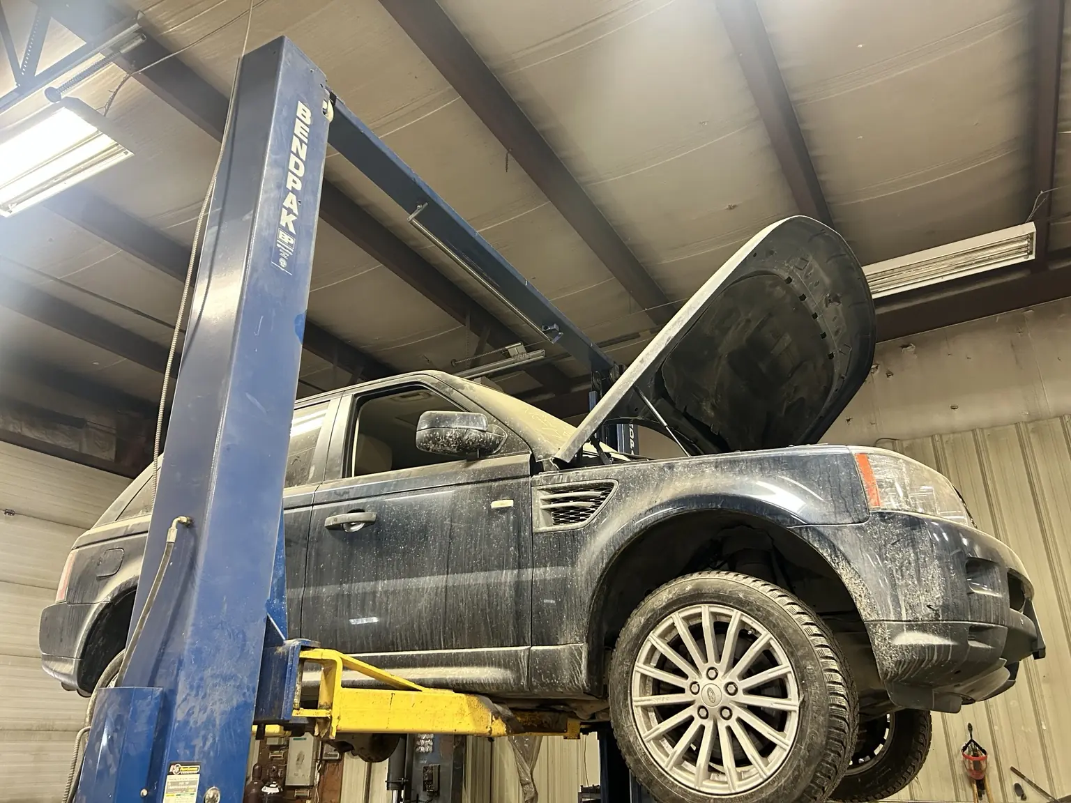 Land Rover raised in the workshop for air suspension service