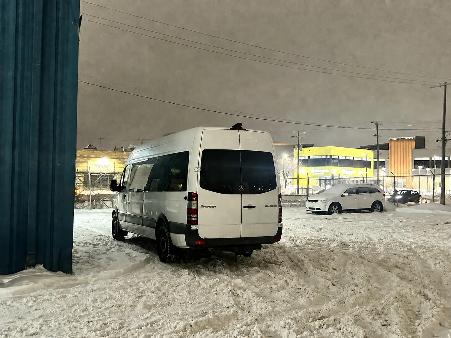 High roof commercial van outside the Winnipeg shop during winter