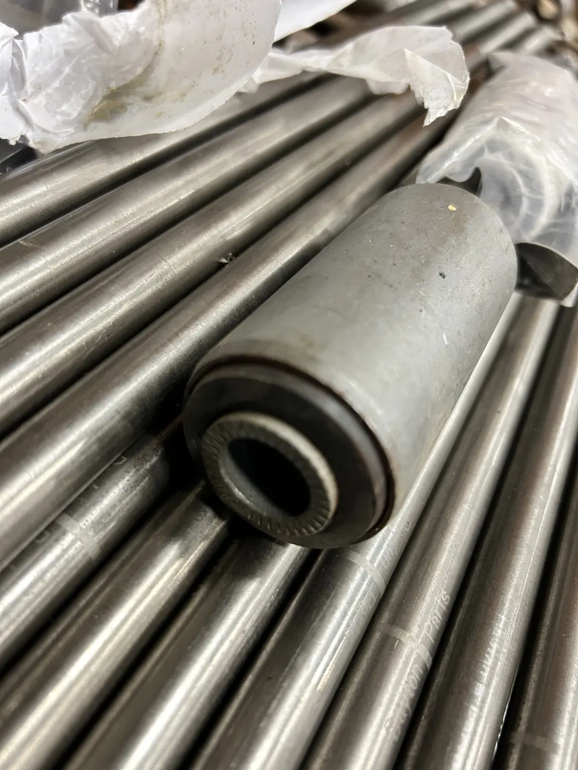 Rubber and steel leaf spring bushing prepared for installation