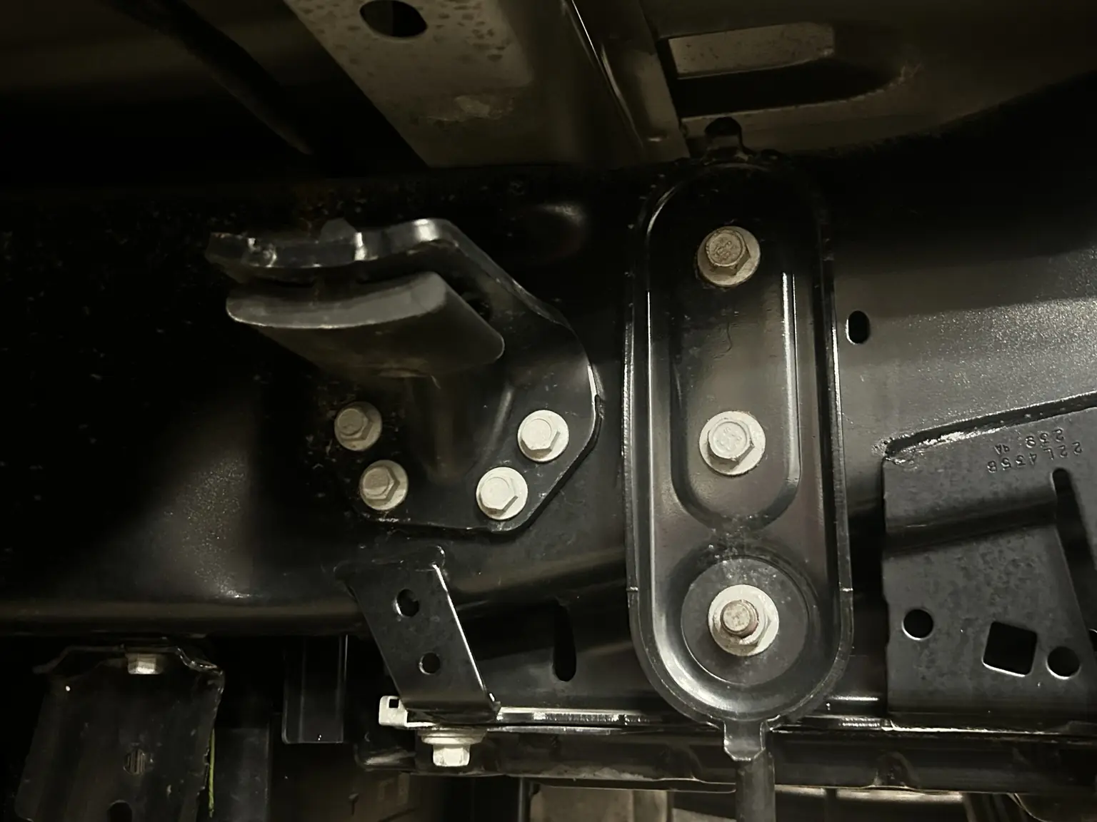 Leaf spring shackle and hanger mounted to a truck frame